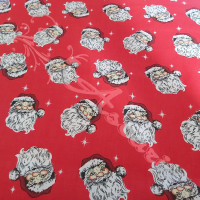 Jolly Santa Faces on Red Polycotton Print