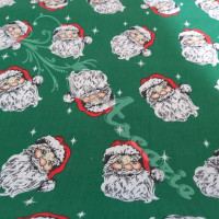 Jolly Santa Faces on Green Polycotton Print