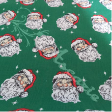 Jolly Santa Faces on Green Polycotton Print