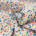 Multi Coloured Ditzy Hearts on White PolyCotton