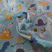 Dinosaurs  on Blue Polycotton