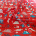 Dinosaurs  on Red Polycotton