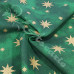 Christmas Gold Stars on Green Background 100% Cotton 