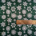 Nordic Snowflakes on Green Polycotton Print Design 1