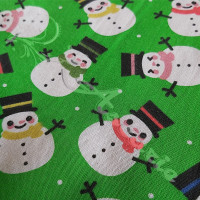 Snowmen on Green Polycotton Print