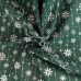 Snowflake drops on Green Polycotton Print