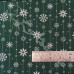 Snowflake drops on Green Polycotton Print