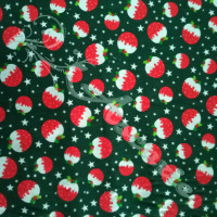 Small Christmas Puds on Green Polycotton Print