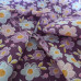 Multi coloured daisy's on Purple  poly-cotton