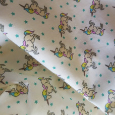 Unicorn on a Cream Background Polycotton 